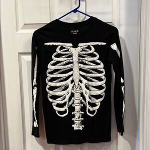 The Childrens Place glow in dark size 14 Skelton graphic shirt.